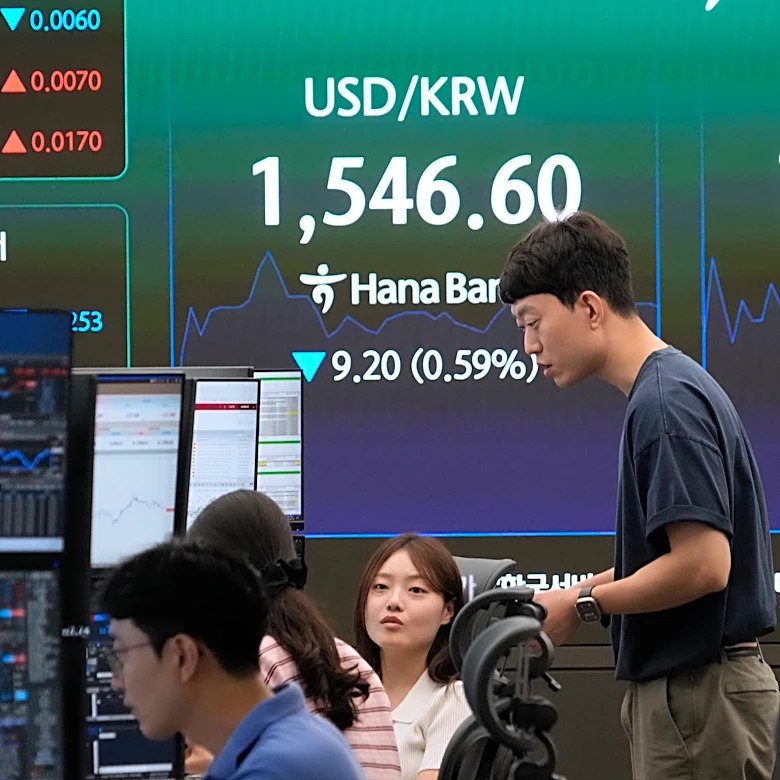 World shares are mixed after Dow hits a new record, as some AI shares bounce back
