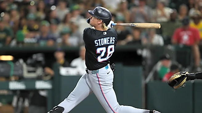 Stowers hits 2 of the Marlins' 5 HRs in a 12-5 win over the A's