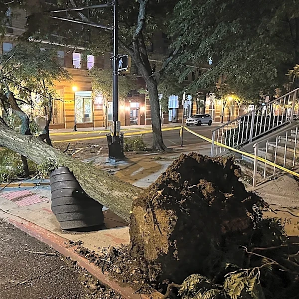 Searing heat and storms mar holiday with 3 children dead in Wisconsin and utility outages widespread