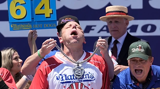Joey Chestnut eats 66 hot dogs to again claim Mustard Belt at Nathan's Famous contest