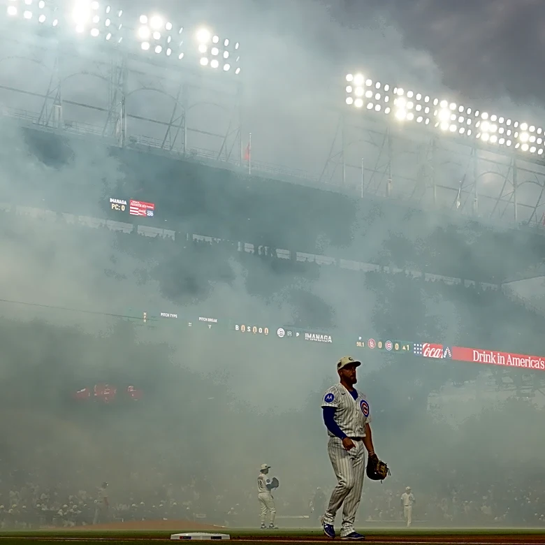 Cubs fans sing `Take Me Home, Country Roads' during fog delay at Wrigley Field
