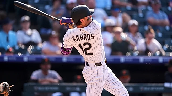 Kyle Karros hits a 3-run homer in the 8th to lift the Rockies past the Giants, 7-6
