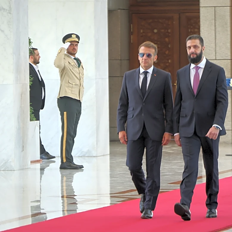 Explosions rock Damascus, wounding 18, as French President Macron visits Syria