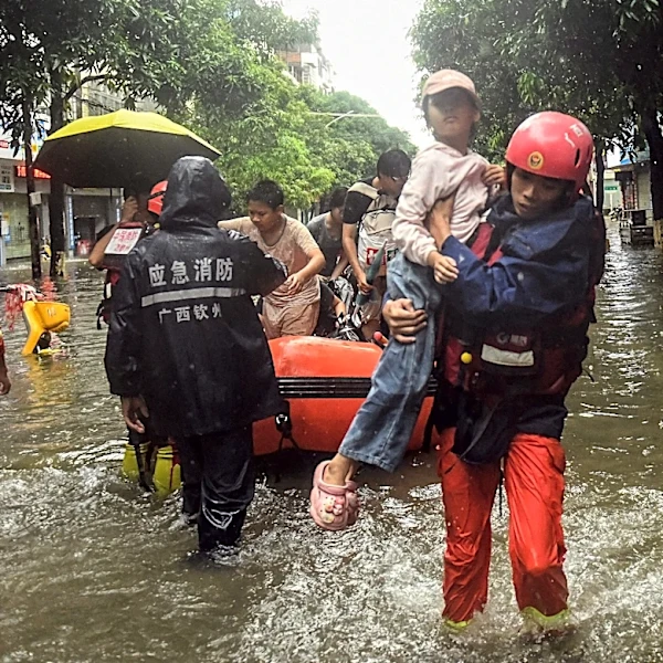A southern Chinese region reels from floods and destruction from remnants of tropical storm