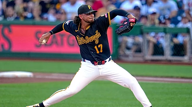 NL East-leading Braves break up Pirates' combined perfect-game bid in the 7th on Albies' single