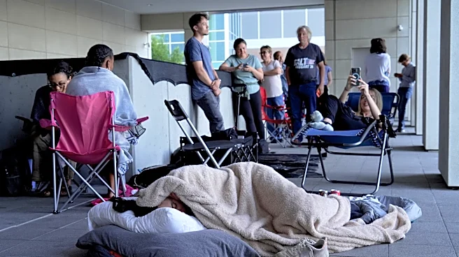 People camp outside court to get scarce public seats in hearing on Charlie Kirk's killing
