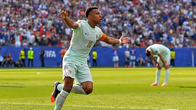 Kylian Mbappé scores his eighth goal of the World Cup, equaling Lionel Messi for the tournament lead