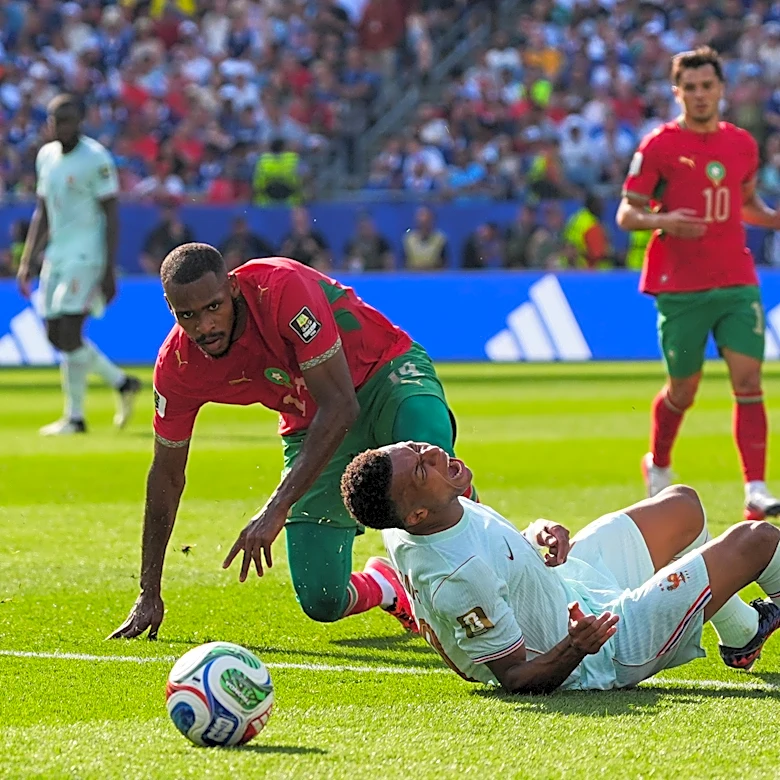 Kylian Mbappé scores his 8th World Cup goal before leaving game with a 'slight' ankle injury