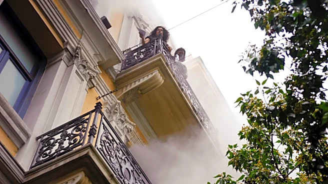 Greek police arrest 2 people over 2010 fatal arson attack on Athens bank