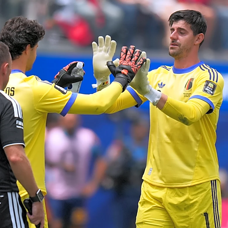 Injured Belgium goalkeeper Thibaut Courtois leaves World Cup quarterfinal loss to Spain