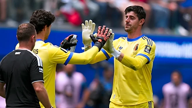 Injured Belgium goalkeeper Thibaut Courtois leaves World Cup quarterfinal loss to Spain