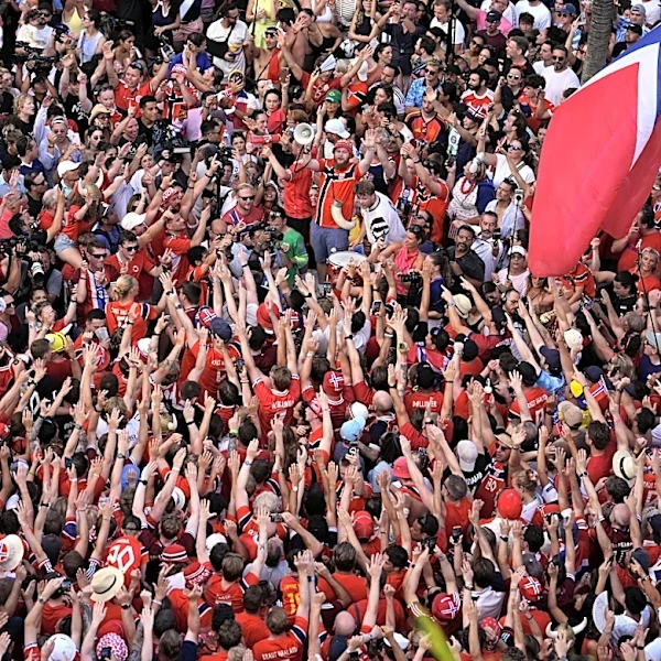 One Extraordinary Photo: Red-clad Norway fans who have become a World Cup sensation