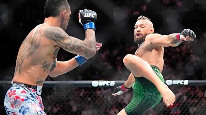 Conor McGregor suffers early knee injury in return, loses to Max Holloway at UFC 329