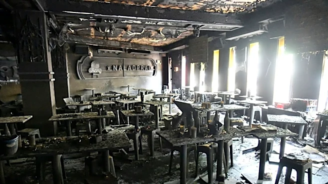 Investigators probe a fire at a music bar in Bangkok that killed at least 27 people