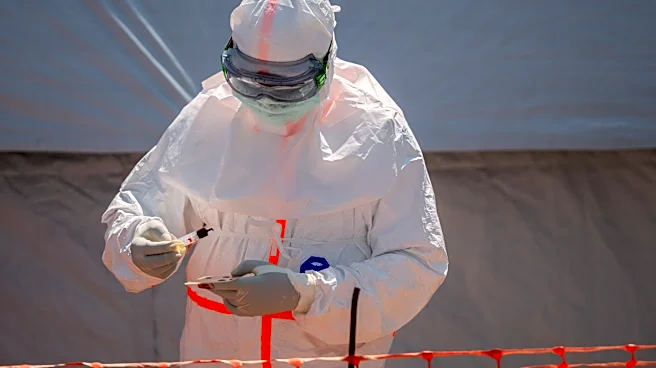 Dozens at an Ebola treatment center in northeast Congo go on strike over unpaid salaries and bonuses