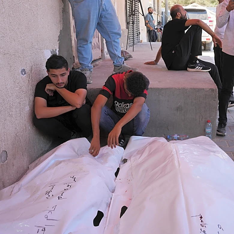 Israel's latest strikes kill a dozen people in Gaza including police officers