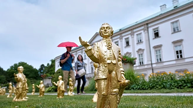 A horde of golden mini-Mozarts marks 270 years since the composer's birth in Salzburg