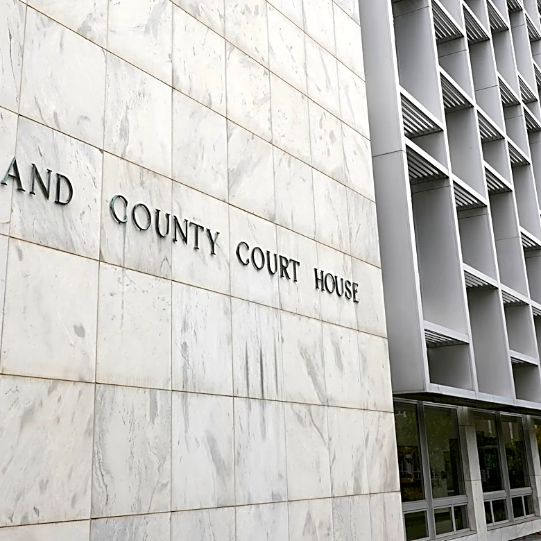 Michigan woman pleads no contest to abuse after 3 kids are found living alone for years