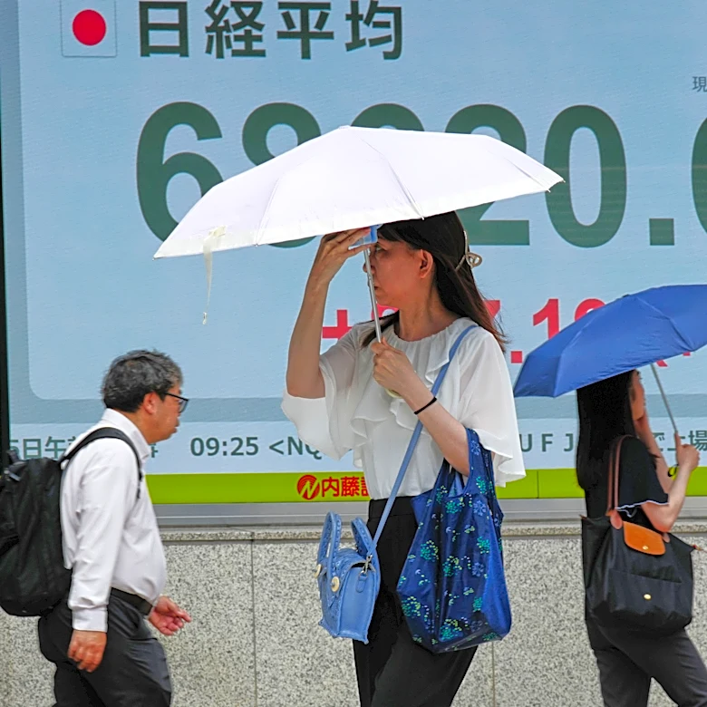 Asian shares sink, with Tokyo down nearly 5% as slumping AI stocks drag world markets lower