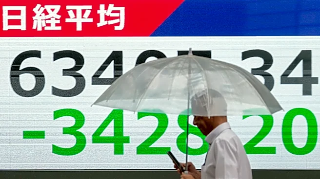 Asian shares sink, with Tokyo down more than 5% as slumping AI stocks drag world markets lower