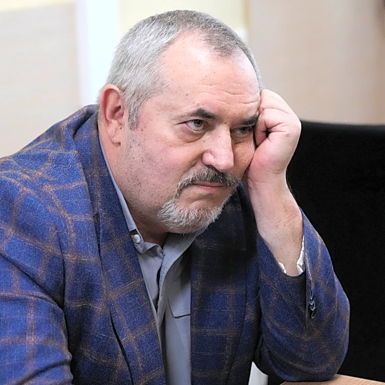A Putin critic is convicted on charges that will keep from campaigning for Russia's parliament