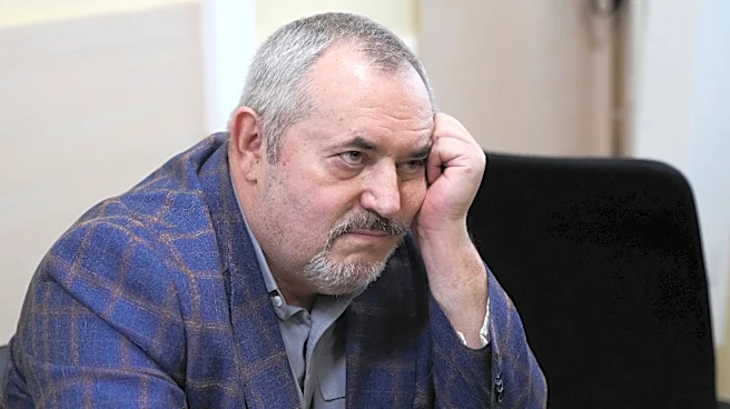 A Putin critic is convicted on charges that will keep from campaigning for Russia's parliament