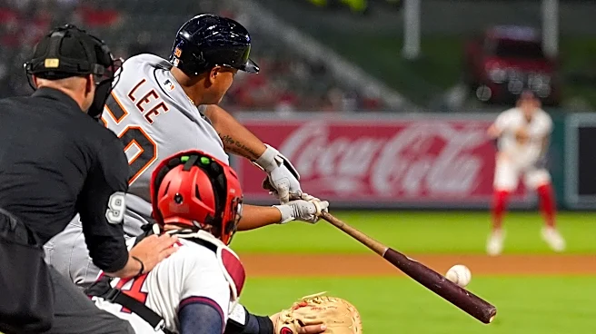 Lee hits clutch double in 9th and Tigers hold on for 2-1 comeback win over Angels