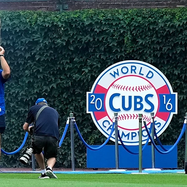 Former Cubs player Anthony Rizzo snares Michael Busch's home run ball in the Wrigley Field bleachers