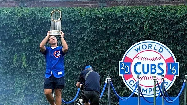 Former Cubs player Anthony Rizzo snares Michael Busch's home run ball in the Wrigley Field bleachers