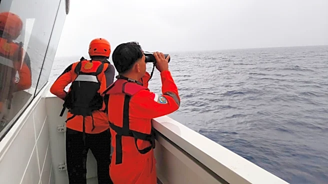 Rescuers in Indonesia find mother and son survivors from sunken passenger boat