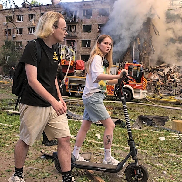 In one of Kyiv's most frequently bombed neighborhoods, residents choose to stay