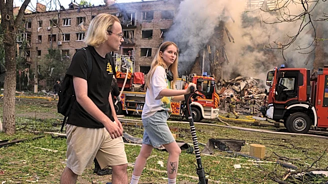 In one of Kyiv's most frequently bombed neighborhoods, residents choose to stay