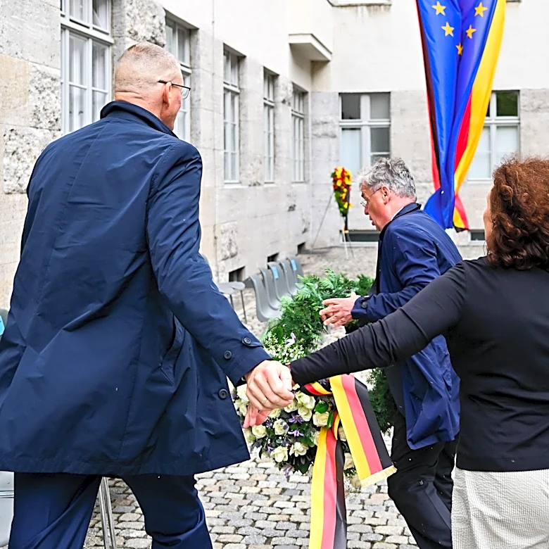 Descendant of Nazi opponent tries to remove far-right party's wreath at Hitler plot memorial event