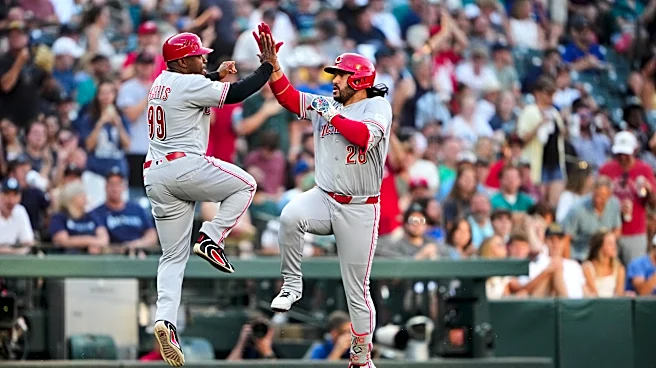 Suárez homers against former team and Burns throws 5 scoreless innings as Reds beat Mariners 4-2