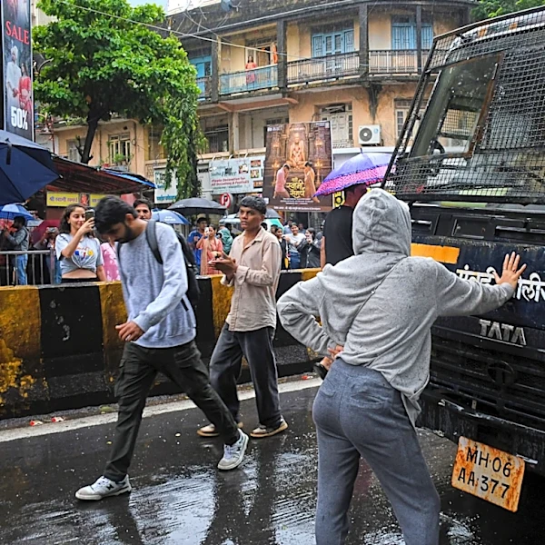 A single photo captures the resolve behind India's “Cockroach” protests