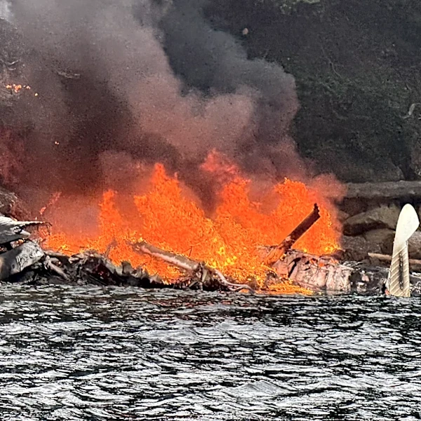 A float plane changed course to avoid a storm before crashing on a Washington island, injuring 11