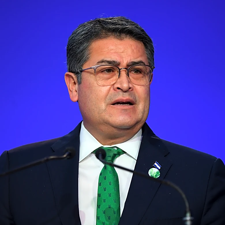 Former President Juan Orlando Hernández returns to Honduras after arrest warrant suspended