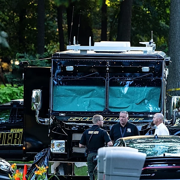 Authorities say man killed his family, then himself, before all were found in Michigan home fire