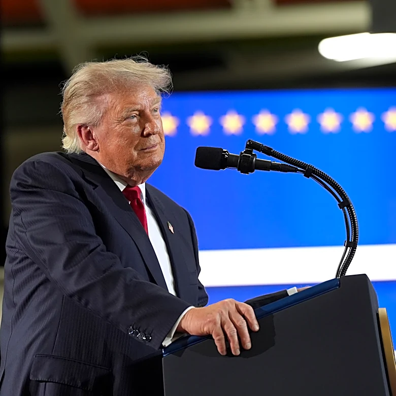 The Latest: Trump praises his sweeping tariffs while in Michigan for a speech on the economy