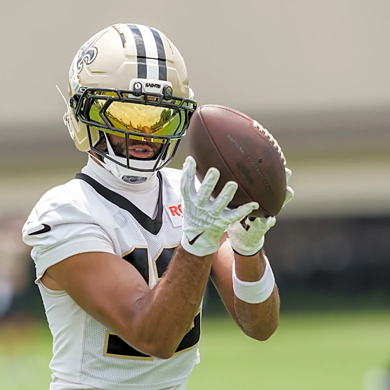 Saints GM Mickey Loomis: receiver Chirs Olave reports for camp as contract negotiations continue