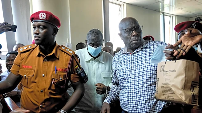 Ugandan opposition leader Besigye is unconscious in hospital after collapsing in court, wife says