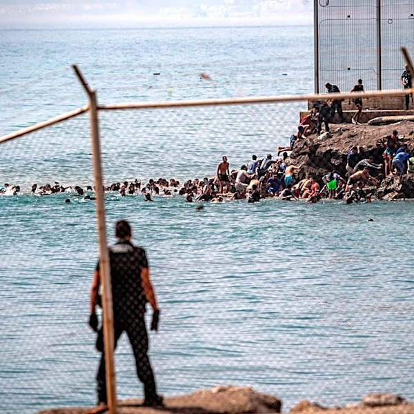 ‘Absolute chaos’ as thousands of people breach Morocco’s border with Spain's Ceuta
