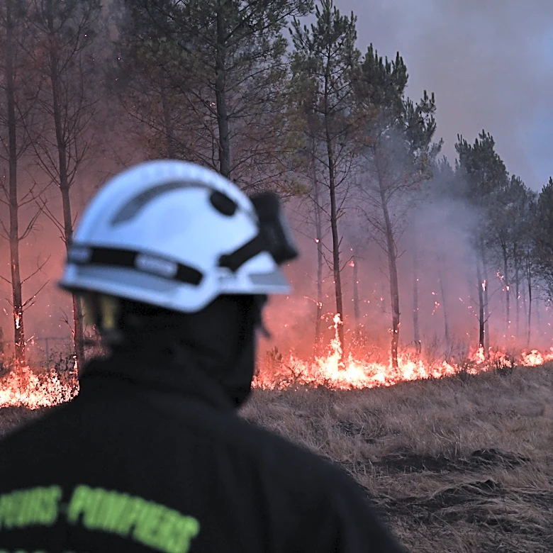 Firefighters battle the last hot spots of a monster wildfire in the southwest