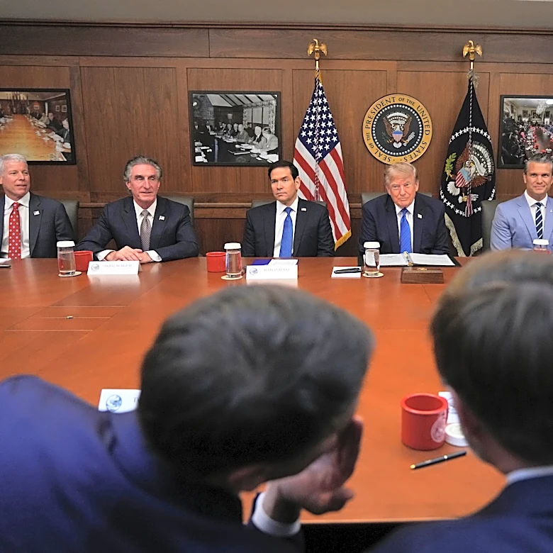 Trump hails a 'unique' Cabinet meeting at Camp David as he seizes on Spain's migration crisis