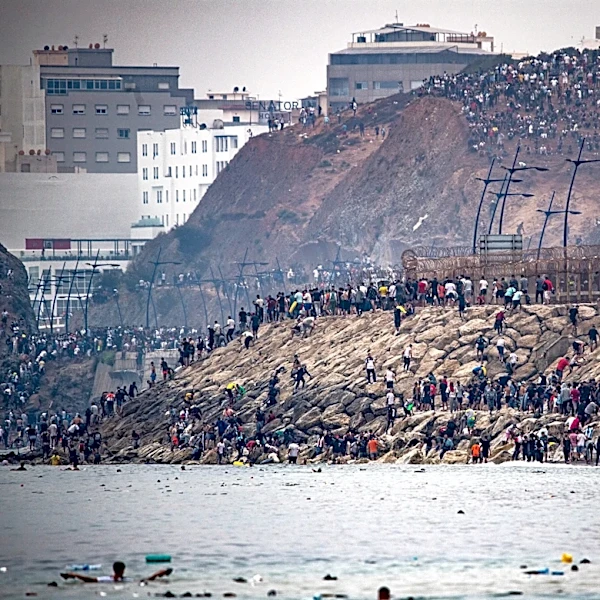 Tens of thousands of migrants voluntarily leave after crossing into Spanish territory of Ceuta