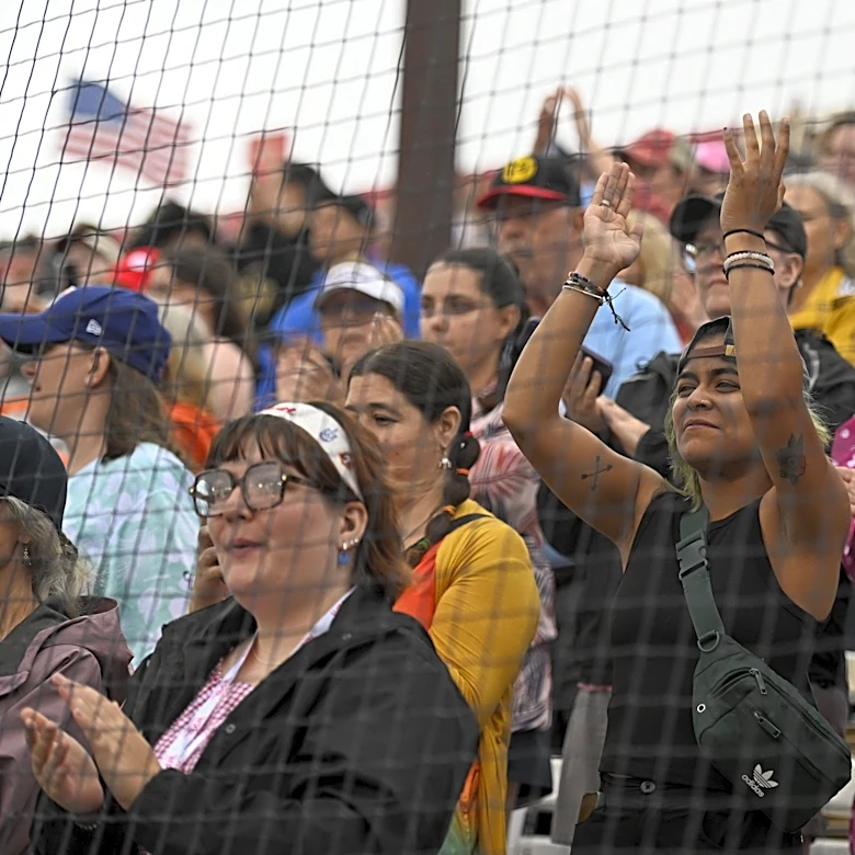 Women's Professional Baseball League makes a rainy debut in front of enthusiastic crowd