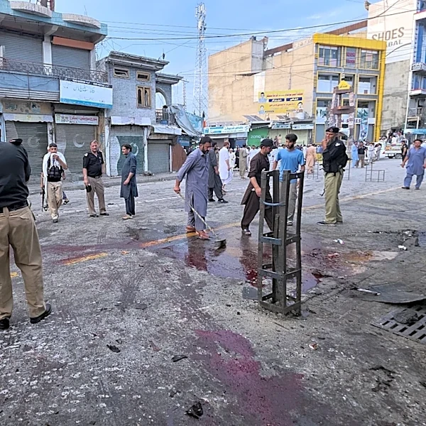 A suicide bomber strikes an anti-militant rally in northwestern Pakistan, killing at least 14