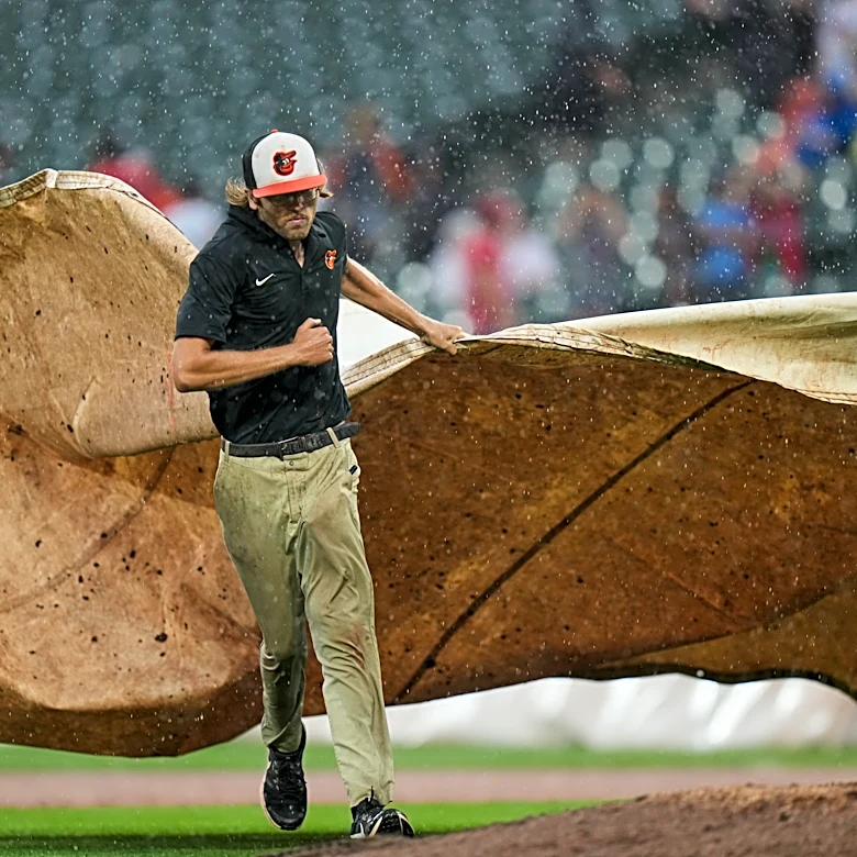 Phillies rout Orioles 8-0 in a game called by rain after 5 1/2 innings