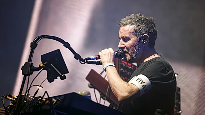 Singapore bans 2 Massive Attack members after pro-Palestinian display at concert