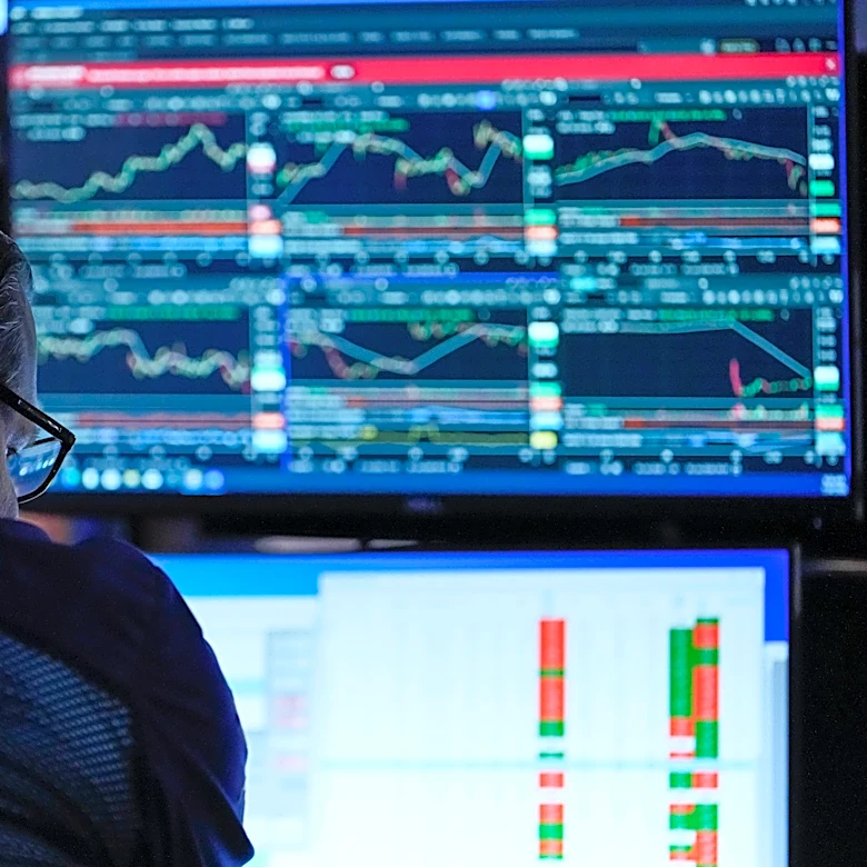 US stocks flirt with a record as profits keep piling up and oil prices ease
